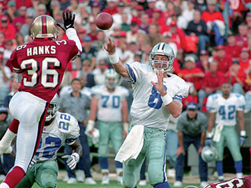 Troy Aikman throwing through Merton Hanks